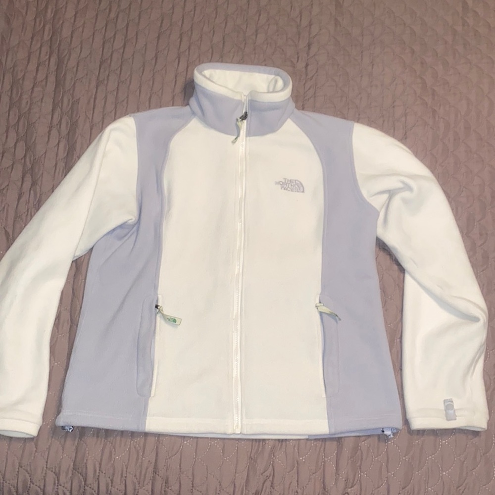Older style North Face fleece zip up. Worn, but still has plenty of life.